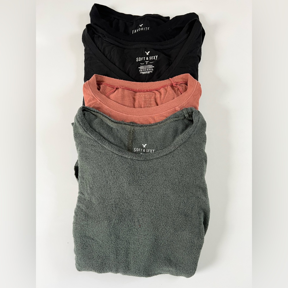 SOLD. 4 pack of “soft & sexy” long sleeves from American Eagle.